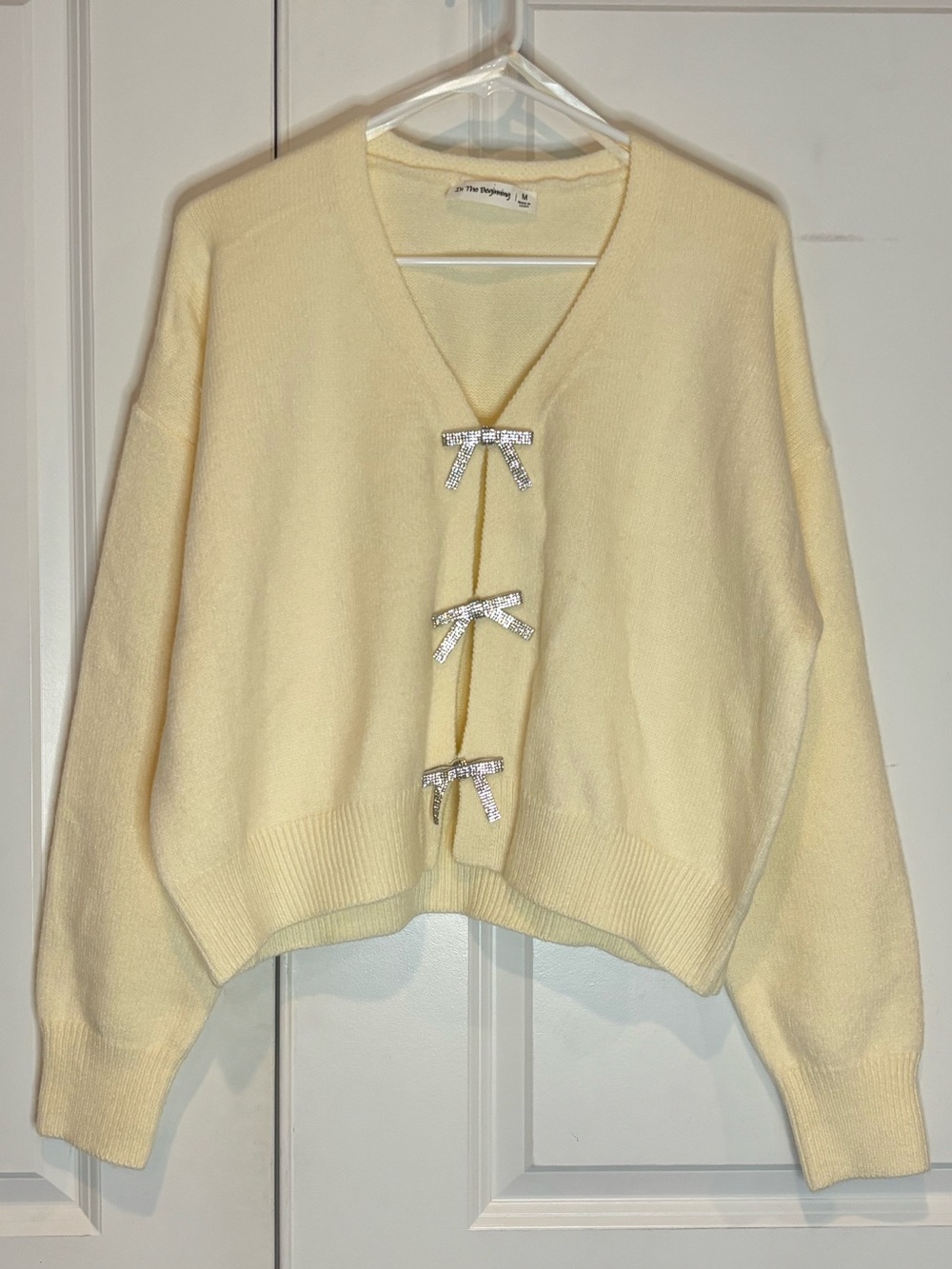In The Beginning Cream V-neck Rhinestone Bow Cardigan Sweater M